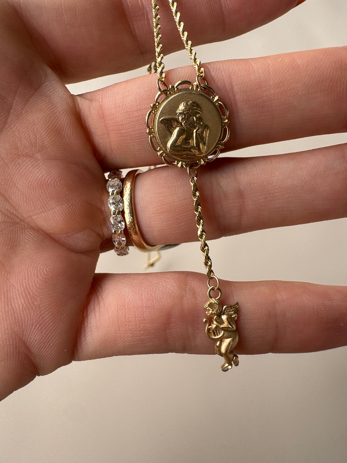vintage 10k yellow gold cherub lariat necklace
